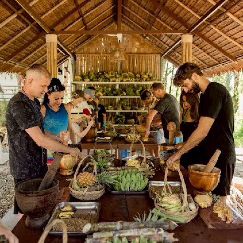 Visitors taking part in a local cultural demonstration near Khao Sok