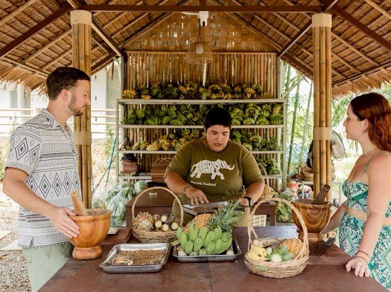 Guests participating in a traditional activity during a Khao Sok tour